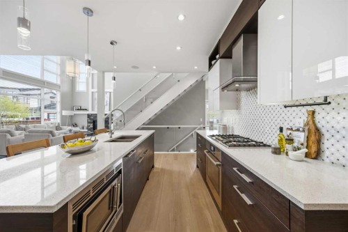 81 West Point Close Sw, Calgary, AB - Indoor Photo Showing Kitchen With Double Sink With Upgraded Kitchen