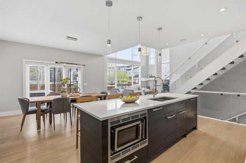 81 West Point Close Sw, Calgary, AB - Indoor Photo Showing Kitchen With Double Sink With Upgraded Kitchen