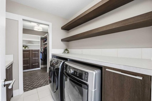 81 West Point Close Sw, Calgary, AB - Indoor Photo Showing Laundry Room
