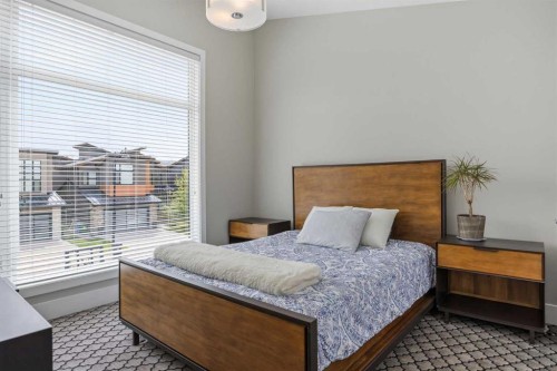 81 West Point Close Sw, Calgary, AB - Indoor Photo Showing Bedroom