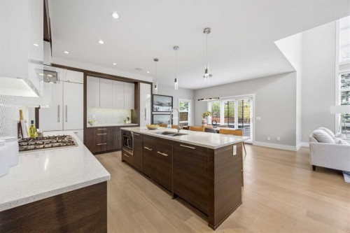 81 West Point Close Sw, Calgary, AB - Indoor Photo Showing Kitchen With Double Sink With Upgraded Kitchen