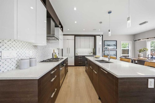 81 West Point Close Sw, Calgary, AB - Indoor Photo Showing Kitchen With Double Sink With Upgraded Kitchen