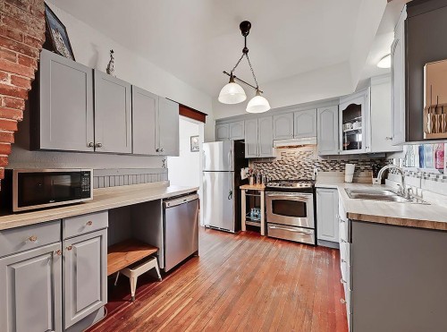 5136 54 Avenue, Stavely, AB - Indoor Photo Showing Kitchen With Double Sink