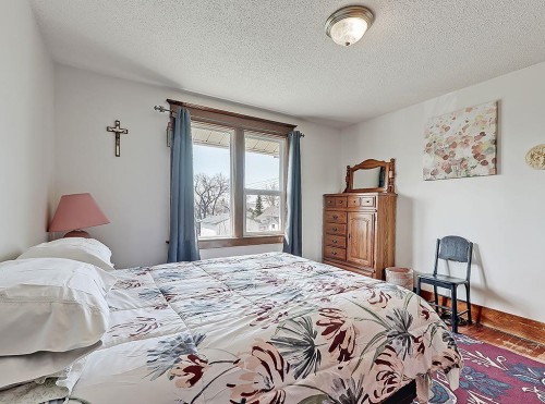 5136 54 Avenue, Stavely, AB - Indoor Photo Showing Bedroom