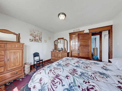 5136 54 Avenue, Stavely, AB - Indoor Photo Showing Bedroom