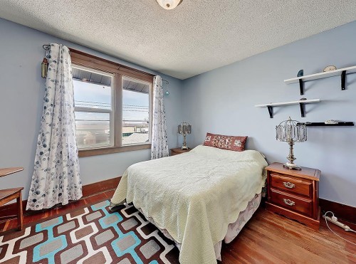 5136 54 Avenue, Stavely, AB - Indoor Photo Showing Bedroom