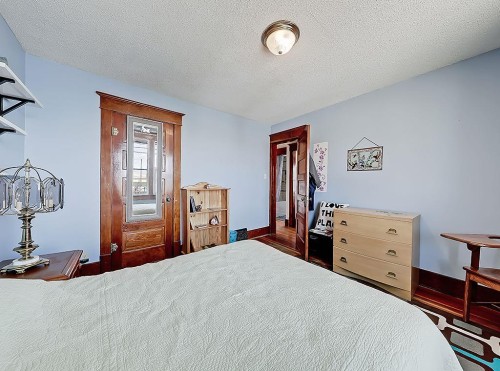 5136 54 Avenue, Stavely, AB - Indoor Photo Showing Bedroom