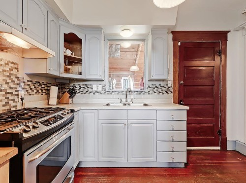 5136 54 Avenue, Stavely, AB - Indoor Photo Showing Kitchen With Double Sink
