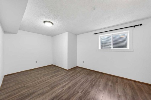 124 Martinwood Court Ne, Calgary, AB - Indoor Photo Showing Other Room