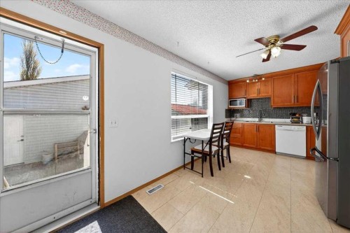 124 Martinwood Court Ne, Calgary, AB - Indoor Photo Showing Kitchen