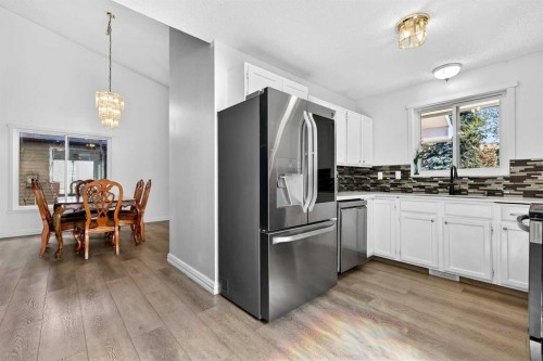 236 Mckerrell Way Se, Calgary, AB - Indoor Photo Showing Kitchen With Upgraded Kitchen