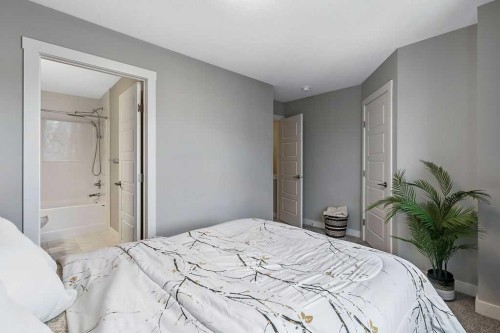 305 Cranbrook Walk Se, Calgary, AB - Indoor Photo Showing Bedroom