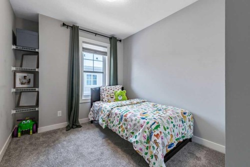 305 Cranbrook Walk Se, Calgary, AB - Indoor Photo Showing Bedroom