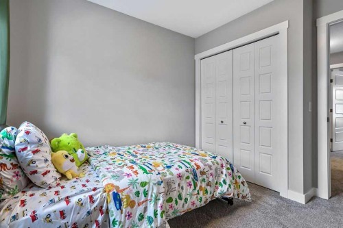 305 Cranbrook Walk Se, Calgary, AB - Indoor Photo Showing Bedroom