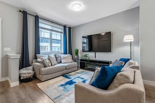 305 Cranbrook Walk Se, Calgary, AB - Indoor Photo Showing Living Room