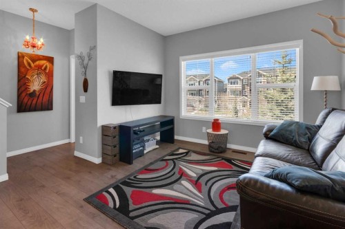 188 Sundown Road, Cochrane, AB - Indoor Photo Showing Living Room