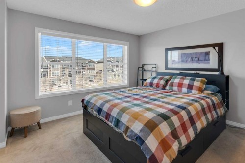 188 Sundown Road, Cochrane, AB - Indoor Photo Showing Bedroom