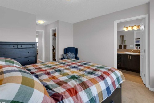 188 Sundown Road, Cochrane, AB - Indoor Photo Showing Bedroom