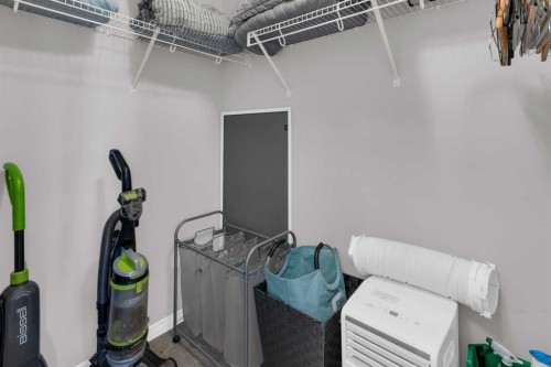 188 Sundown Road, Cochrane, AB - Indoor With Storage