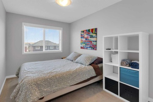 188 Sundown Road, Cochrane, AB - Indoor Photo Showing Bedroom