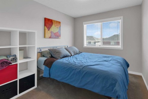 188 Sundown Road, Cochrane, AB - Indoor Photo Showing Bedroom