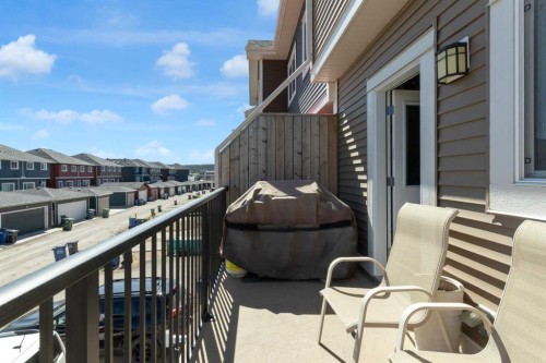 188 Sundown Road, Cochrane, AB - Outdoor With Balcony