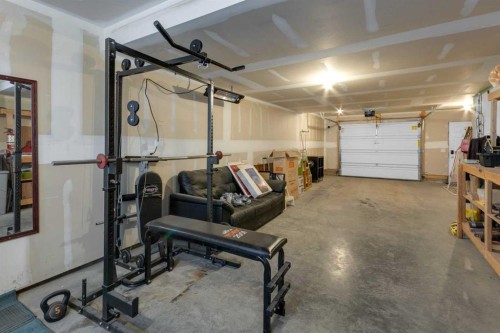 188 Sundown Road, Cochrane, AB - Indoor Photo Showing Garage