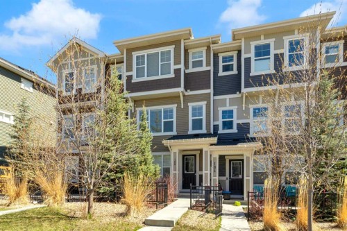 188 Sundown Road, Cochrane, AB - Outdoor With Facade
