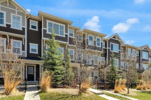 188 Sundown Road, Cochrane, AB - Outdoor With Facade