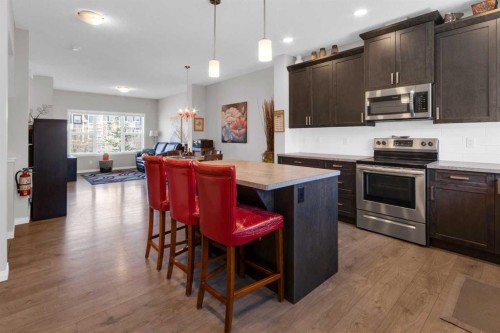188 Sundown Road, Cochrane, AB - Indoor Photo Showing Kitchen With Stainless Steel Kitchen With Upgraded Kitchen