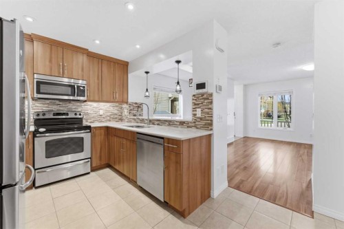 547 Windstone Common Sw, Airdrie, AB - Indoor Photo Showing Kitchen
