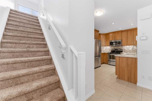 547 Windstone Common Sw, Airdrie, AB - Indoor Photo Showing Kitchen