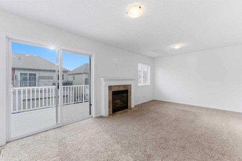 547 Windstone Common Sw, Airdrie, AB - Indoor With Fireplace