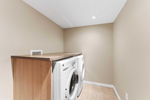 547 Windstone Common Sw, Airdrie, AB - Indoor Photo Showing Laundry Room