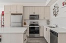 6302-151 Legacy Main Street Se, Calgary, AB  - Indoor Photo Showing Kitchen With Stainless Steel Kitchen With Double Sink 