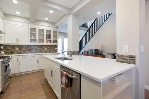 4827 22 Avenue Nw, Calgary, AB - Indoor Photo Showing Kitchen With Double Sink With Upgraded Kitchen