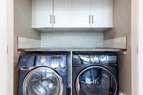 4827 22 Avenue Nw, Calgary, AB - Indoor Photo Showing Laundry Room