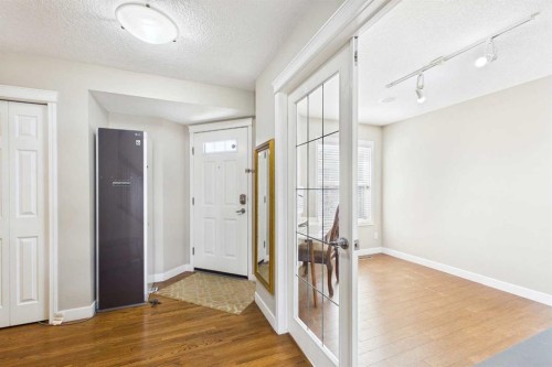 149 Tuscany Ravine Bay Nw, Calgary, AB - Indoor Photo Showing Other Room
