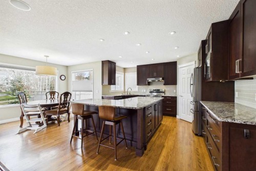 149 Tuscany Ravine Bay Nw, Calgary, AB - Indoor Photo Showing Kitchen With Upgraded Kitchen