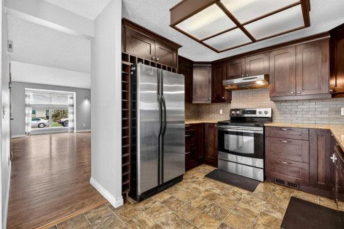 32 Millrise Crescent Sw, Calgary, AB - Indoor Photo Showing Kitchen With Stainless Steel Kitchen