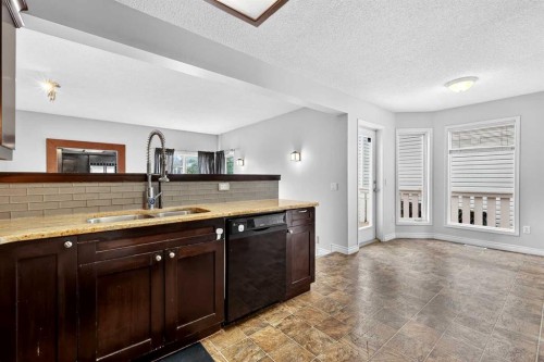 32 Millrise Crescent Sw, Calgary, AB - Indoor Photo Showing Kitchen With Double Sink
