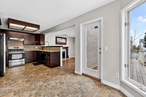 32 Millrise Crescent Sw, Calgary, AB - Indoor Photo Showing Kitchen With Upgraded Kitchen