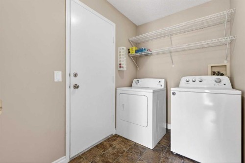 32 Millrise Crescent Sw, Calgary, AB - Indoor Photo Showing Laundry Room
