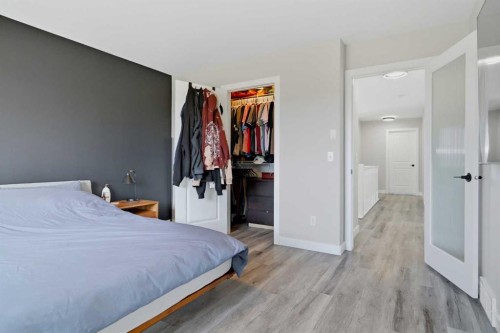 115 Everwoods Park Sw, Calgary, AB - Indoor Photo Showing Bedroom