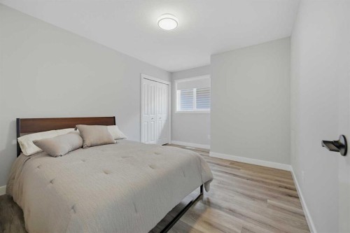 115 Everwoods Park Sw, Calgary, AB - Indoor Photo Showing Bedroom