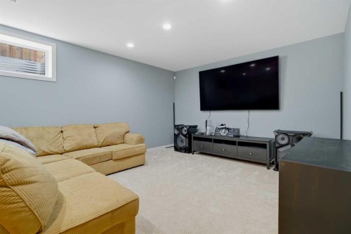 115 Everwoods Park Sw, Calgary, AB - Indoor Photo Showing Living Room