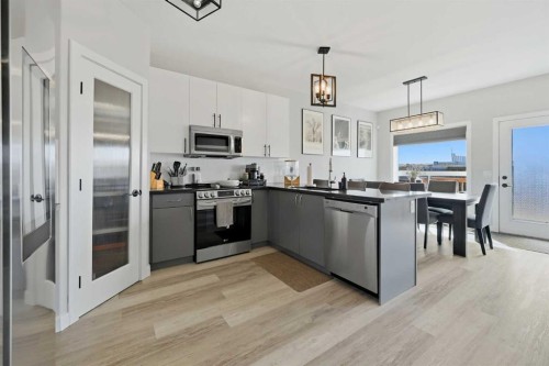 115 Everwoods Park Sw, Calgary, AB - Indoor Photo Showing Kitchen With Stainless Steel Kitchen