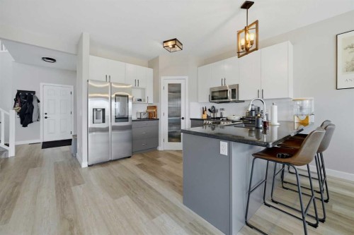 115 Everwoods Park Sw, Calgary, AB - Indoor Photo Showing Kitchen With Stainless Steel Kitchen With Upgraded Kitchen