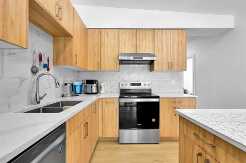 5023 North Haven Drive Nw, Calgary, AB - Indoor Photo Showing Kitchen With Double Sink