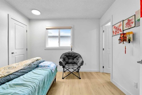 5023 North Haven Drive Nw, Calgary, AB - Indoor Photo Showing Bedroom